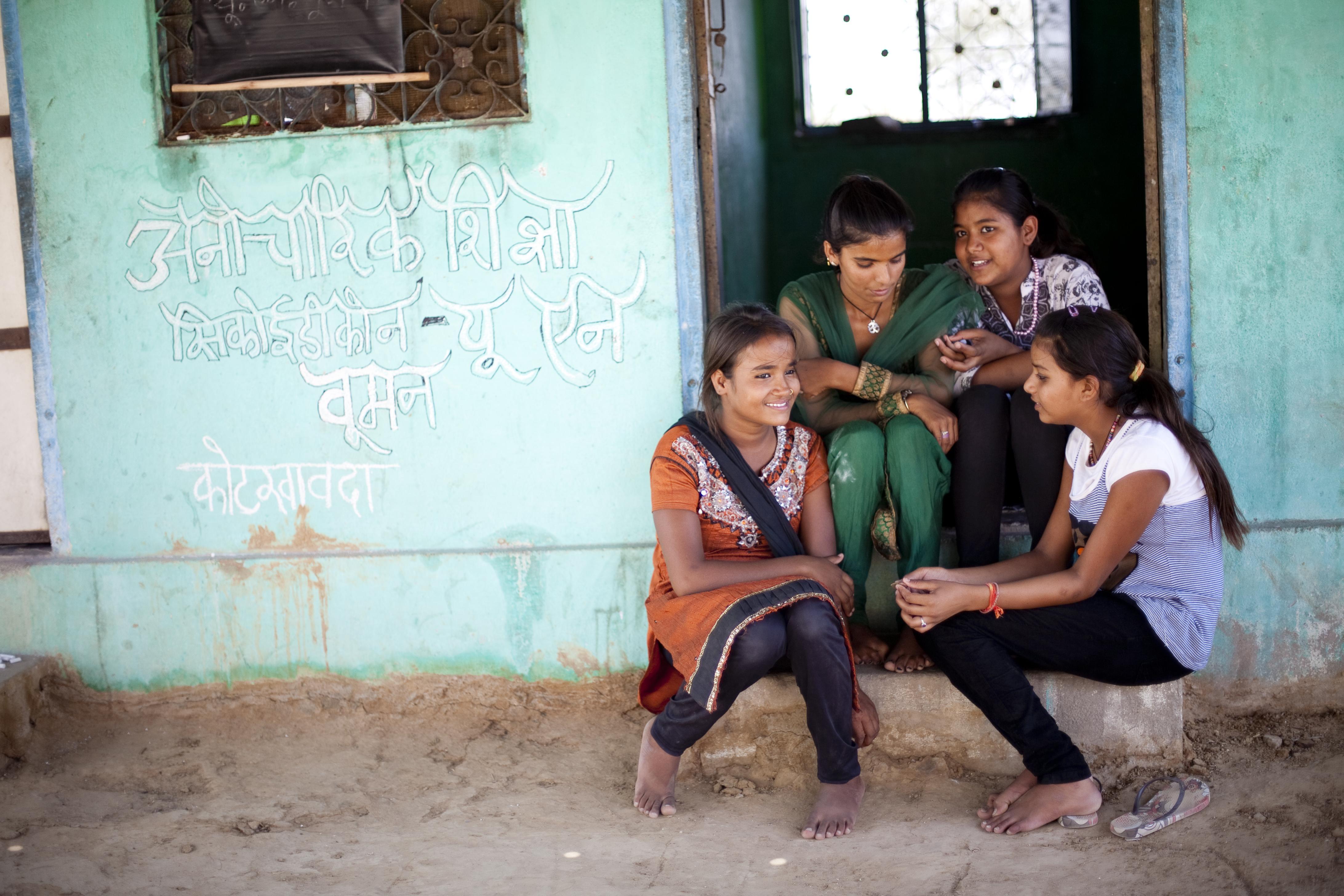 Girls at the Non Formal Education centre. The bridge course conducted by the NFE centre has allowed three girls of the Nat community who dropped out of school to continue their studies again.