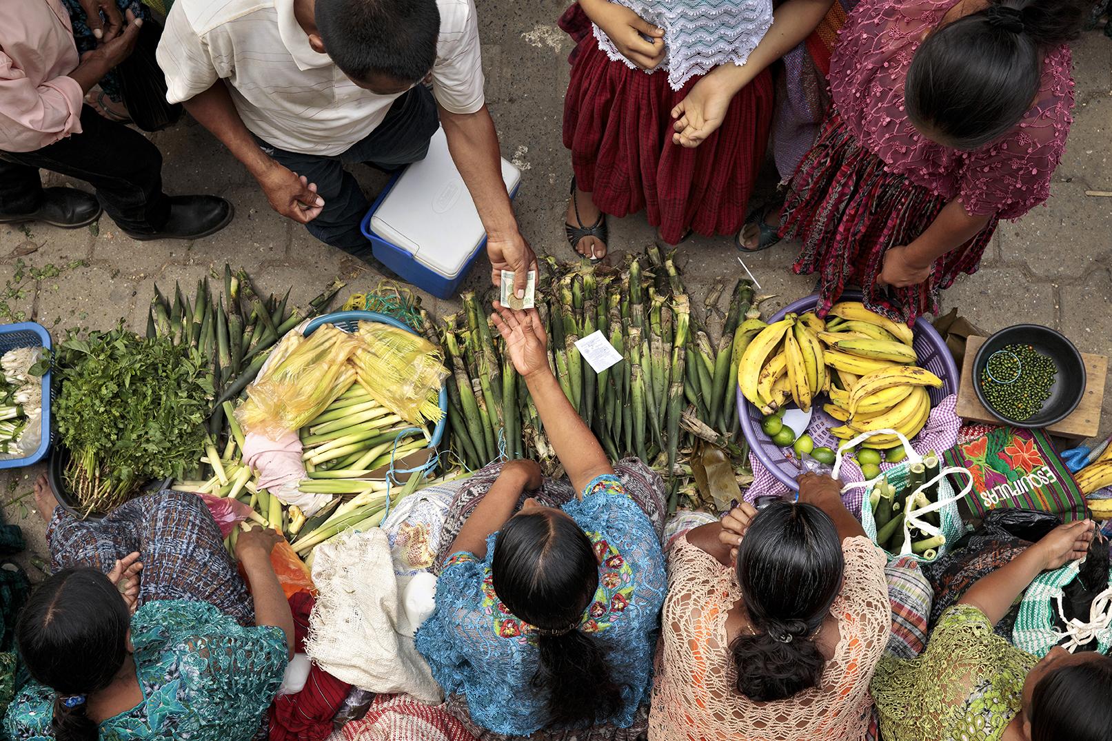 Scenes from the municipal market in Tucuru, Guatemala.  Indigenous women of Guatemala’s Polochic valley are feeding their families, growing their businesses and saving more money than ever before.  With the help of a joint UN programme that’s empowering rural women, women's groups in the area have learned to produce shampoo in bigger batches and in different varieties—such as aloe, cacao, avocado and honey—and sell them in local markets.