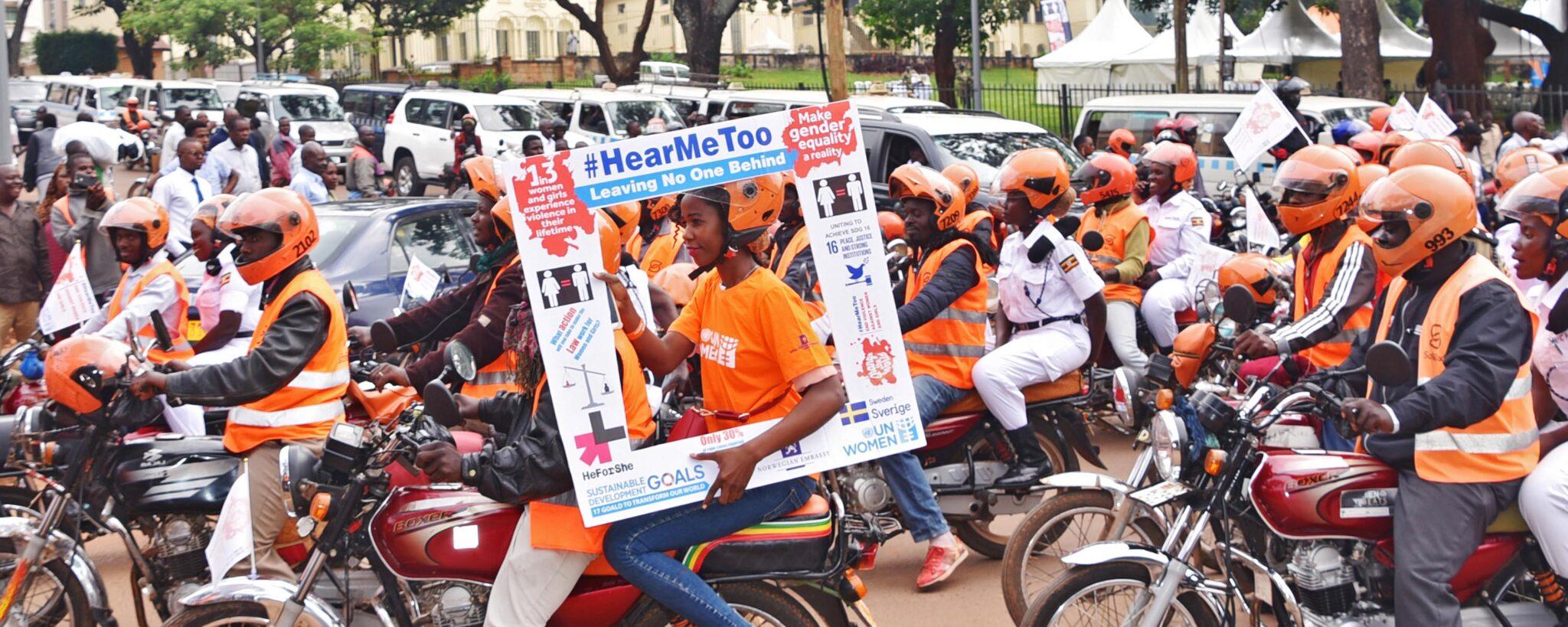 Ugandan police join UN Women Uganda as part of the 'Orange the World' campaign to end violence against women and girls. Through its global program Women Count, UN Women’s data collection and analysis has led to policies to address violence against women in Uganda and several other countries. ©UN Women/Martin Ninsiima